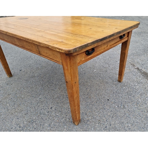 109 - A Victorian pine Farmhouse Table fitted drawer to each end mounted upon square cut tapering supports... 