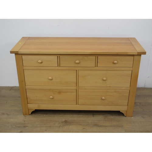 114 - A modern beechwood Chest of seven drawers 4ft 5in W x 2ft 8in H