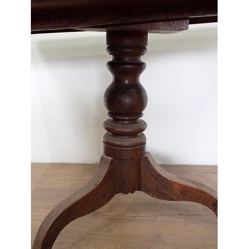 124 - A 19th Century elm rectangular tilt top Supper Table on tripod base 3ft 4in W x 2ft 4in H