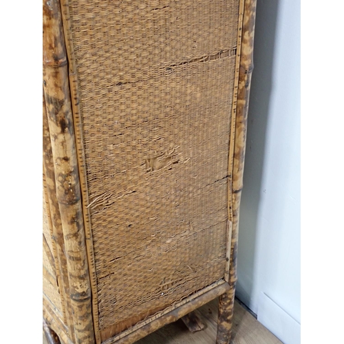 13 - An antique bamboo and glazed Cabinet fitted four cupboard doors 6ft 5in H x 3ft W