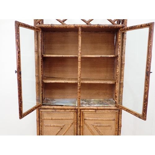 13 - An antique bamboo and glazed Cabinet fitted four cupboard doors 6ft 5in H x 3ft W