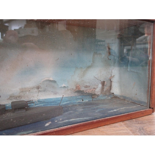 140 - A cased Diorama of a Battleship 19 1/2in W x 5in H