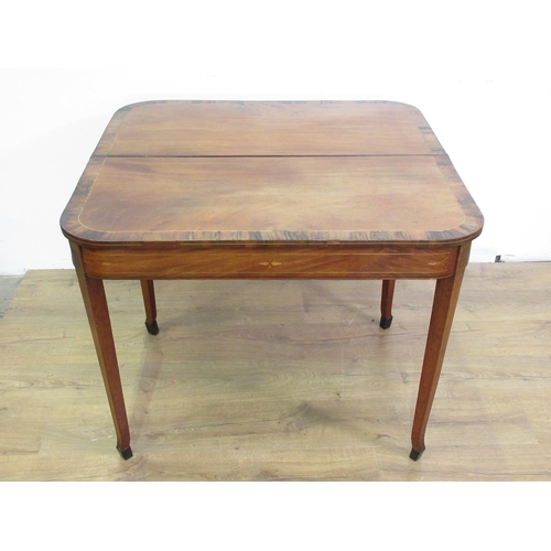 142 - A 19th Century mahogany and inlaid fold-over Tea Table on square cut supports 3ft 1in W x 2ft 5in H