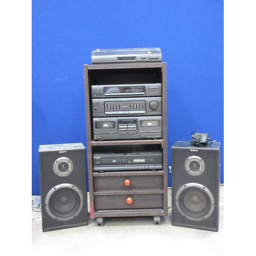 146 - A Sony Sound System and two Speakers and a Matsui Sound System in shelves (passed PAT)