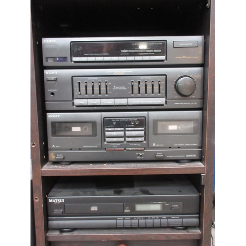 146 - A Sony Sound System and two Speakers and a Matsui Sound System in shelves (passed PAT)