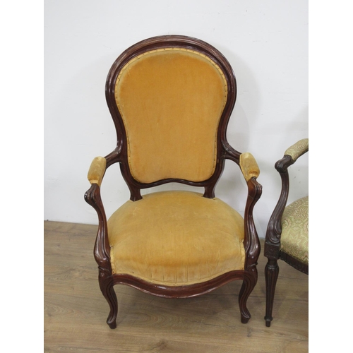 148 - A mahogany framed Elbow Chair with yellow upholstery and a mahogany green upholstered Elbow Chair