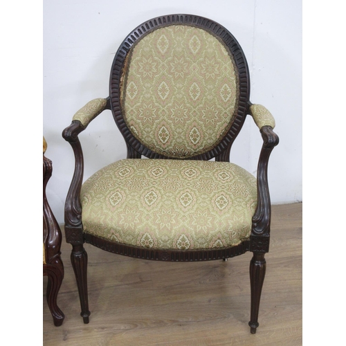 148 - A mahogany framed Elbow Chair with yellow upholstery and a mahogany green upholstered Elbow Chair