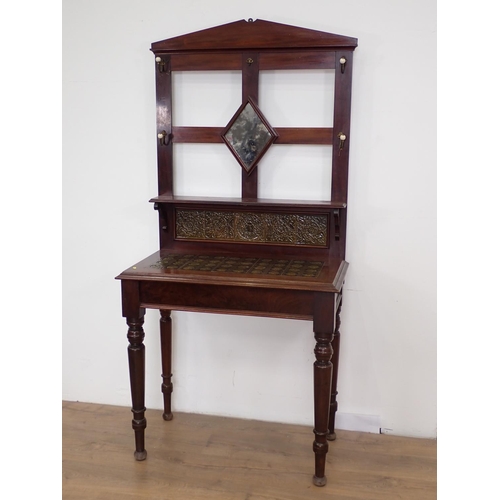 16 - An Arts and Crafts mahogany Hall Stand with tile top mounted upon turned supports 6ft 6in H x 3ft 2i... 