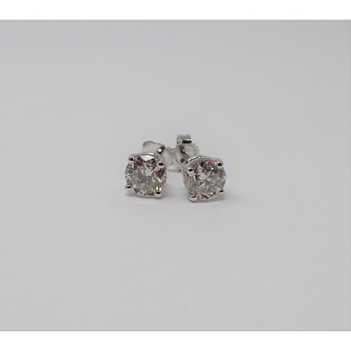 163 - A pair of Diamond Ear Studs each claw-set brilliant-cut stone, total diamond weight 1.57cts, in 18ct... 