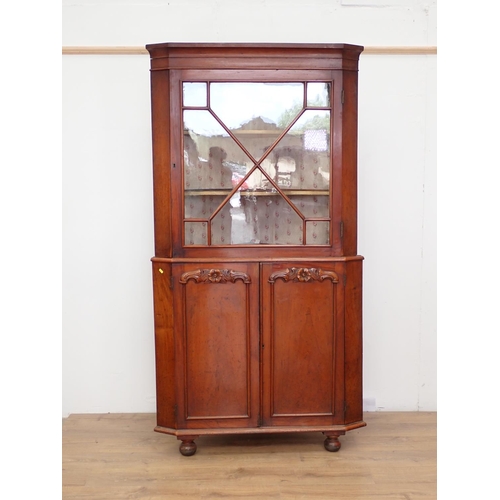 17 - A 19th Century mahogany and glazed standing Corner Cabinet the base fitted pair of cupboard doors 6f... 