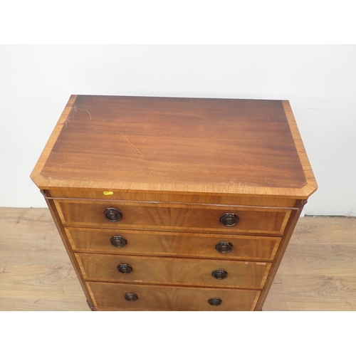 20 - A 20th Century mahogany veneered and crossbanded Chest of four graduated drawers 3ft H x 2ft 6in W