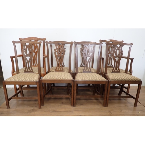 21 - A set of six Georgian style oak Dining Chairs and a pair of similar Carvers, one possibly of later d... 