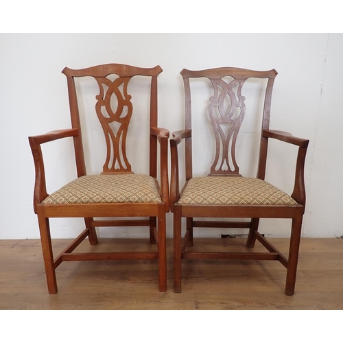 21 - A set of six Georgian style oak Dining Chairs and a pair of similar Carvers, one possibly of later d... 