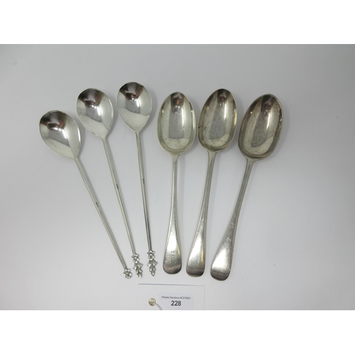 228 - Three Indian silver Serving Spoons with flower finials and three 20th Century silver Table Spoons