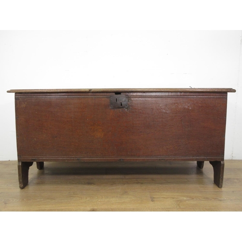 23 - A 17th Century oak six plank Sword Chest or Coffer on cupid's bow shaped end supports, the top with ... 