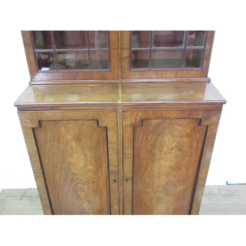 3 - A 19th Century mahogany and glazed Bookcase above base fitted pair of cupboard doors (converted from... 