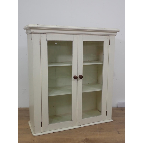 30 - An antique white painted and glazed two door Bookcase 3ft 3in H x 3ft W