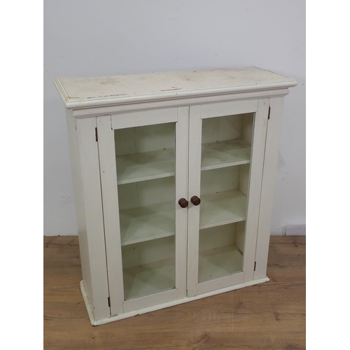 30 - An antique white painted and glazed two door Bookcase 3ft 3in H x 3ft W