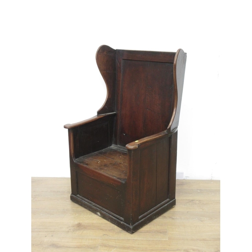 315 - An 18th Century oak wing back Lambing Chair fitted drawer to base 4ft 1in H x 2ft 7in W