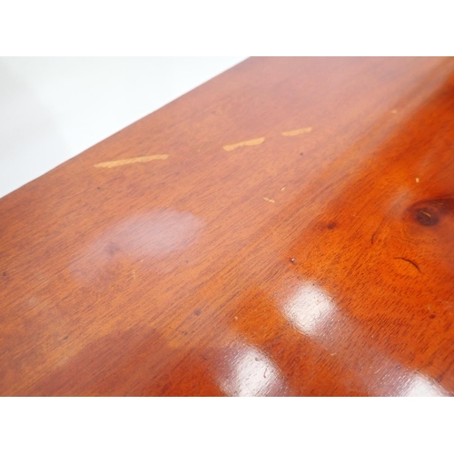 32 - A 19th Century mahogany fold-over Tea Table mounted upon square cut supports 3ft W x 2ft 5in H