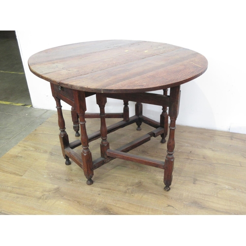 322 - An antique oak Gateleg Table on baluster turned supports 3ft W x 2ft 3 1/2in H