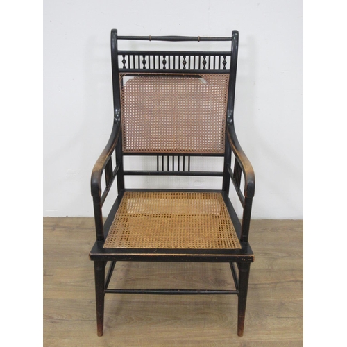 345 - A Victorian ebonised and cane Elbow Chair A/F 3ft 1in H x 1ft 8in H