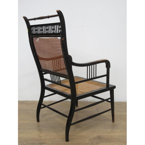 345 - A Victorian ebonised and cane Elbow Chair A/F 3ft 1in H x 1ft 8in H