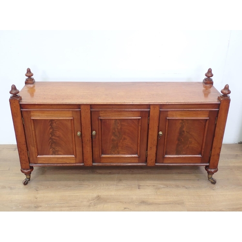 35 - A Victorian mahogany Buffet fitted three cupboard doors 5ft W x 2ft 9in H