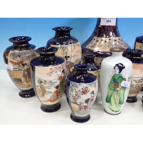 384 - A quantity of Japanese blue Vases, a pair of cloisonné Vases and another cloisonné Vase, som eA/F