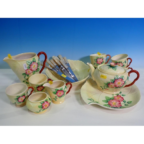 393 - A quantity of Woodsware 'Jasmine' Dinner ware and a Carltonware part Tea Service