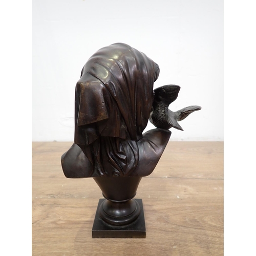 418 - An Art Deco bronze effect Sculpture of a girl and a Bust of a Girl with dove