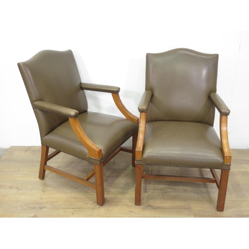 424 - A pair of 20th Century beechwood framed Armchairs with brown leather effect upholstery 3ft 4in H x 2... 