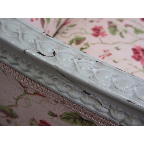 427 - A 19th Century French green painted and floral carved Settee with white trailing geranium decorated ... 