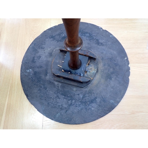 46 - A Victorian slate topped circular Pillar Table with floral painted top mounted upon tripod base 2ft ... 