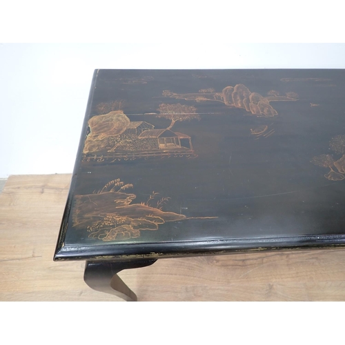 51 - A black lacquered Side Table fitted two frieze drawers mounted upon cabriole supports 3ft 11in W x 2... 