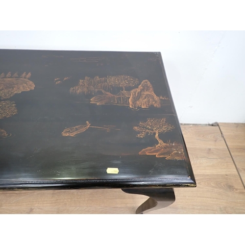 51 - A black lacquered Side Table fitted two frieze drawers mounted upon cabriole supports 3ft 11in W x 2... 