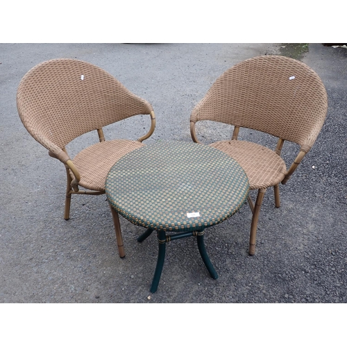 535 - A wicker effect Garden Table and two Chairs