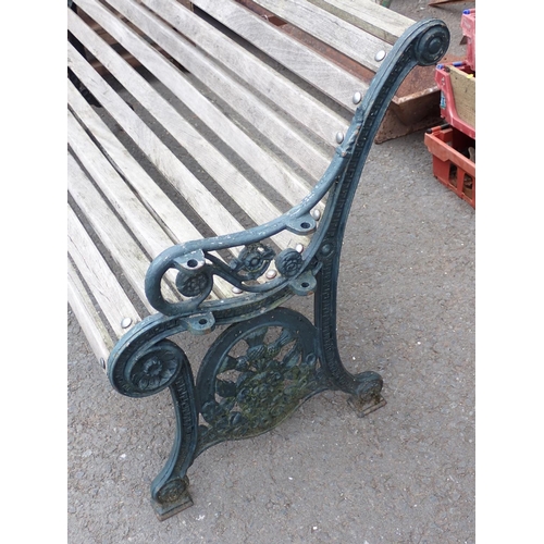 539 - A cast iron Garden Bench with wooden slats 5ft 5in W x 2ft 10in H