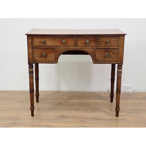 55 - A Regency mahogany and ebonised strung Side Table fitted four drawers mounted upon turned supports 3... 