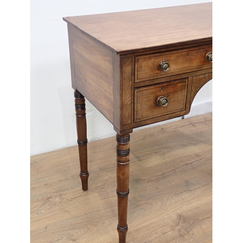 55 - A Regency mahogany and ebonised strung Side Table fitted four drawers mounted upon turned supports 3... 