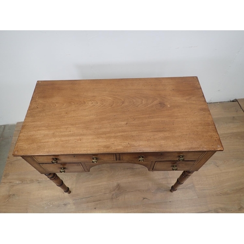 55 - A Regency mahogany and ebonised strung Side Table fitted four drawers mounted upon turned supports 3... 