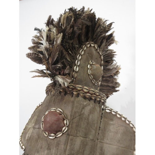 568 - A West African ceremonial Mask with feather head dress