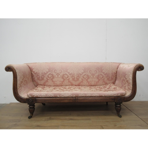 583 - A William IV rosewood and pink upholstered Settee on fluted supports 7ft W x 2ft 9in H