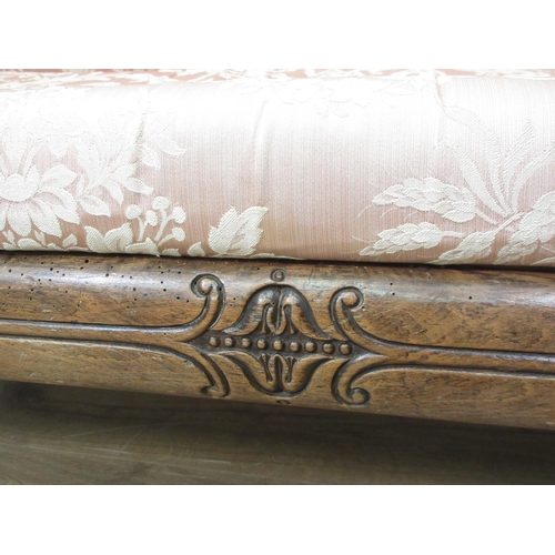 583 - A William IV rosewood and pink upholstered Settee on fluted supports 7ft W x 2ft 9in H