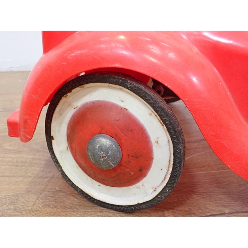 606 - A plastic Noddy type Pedal Car 2ft 3in L