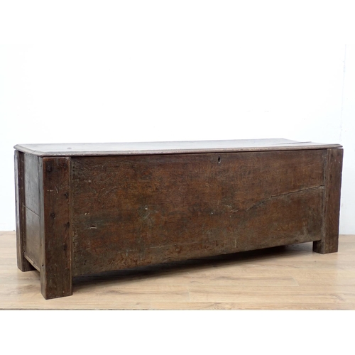 61 - A 17th Century Welsh Borders type oak Coffer of plank construction within dug out supports 5ft W x 1... 