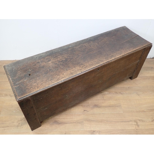 61 - A 17th Century Welsh Borders type oak Coffer of plank construction within dug out supports 5ft W x 1... 