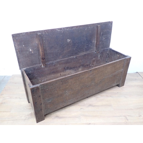 61 - A 17th Century Welsh Borders type oak Coffer of plank construction within dug out supports 5ft W x 1... 