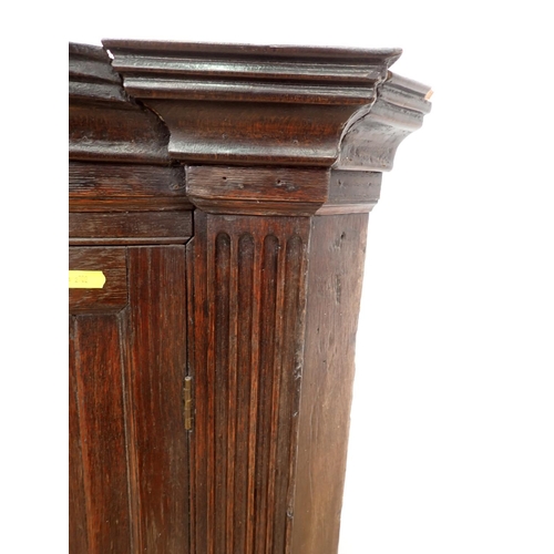 610 - A 19th Century oak bow fronted Corner Cupboard 3ft 11in H x 3ft W