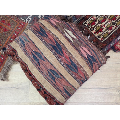 626 - Five North African carpet Saddle Bags and a Cushion